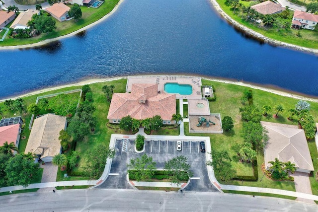 birds eye view of property featuring a water view