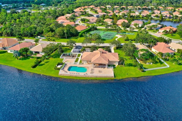 birds eye view of property featuring a residential view and a water view