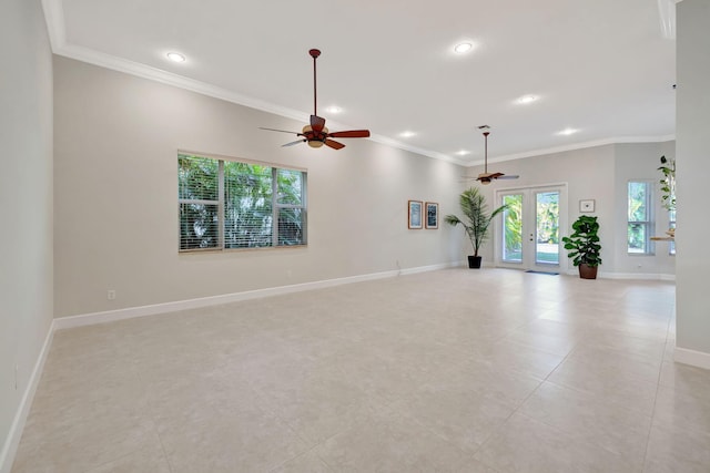 unfurnished room with baseboards, a ceiling fan, ornamental molding, french doors, and recessed lighting