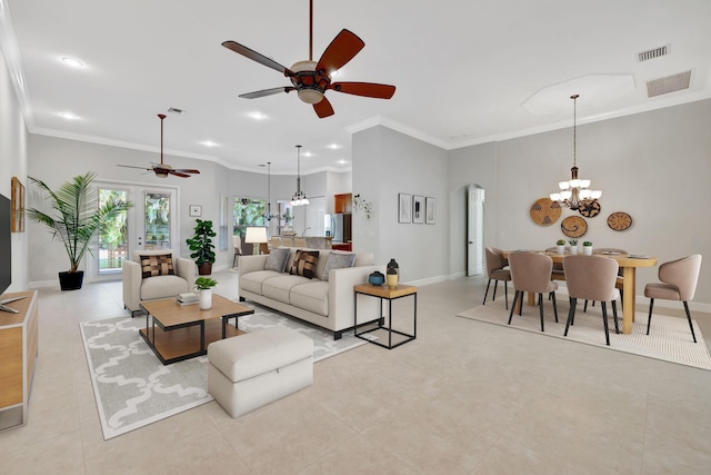 living room with baseboards, visible vents, and crown molding