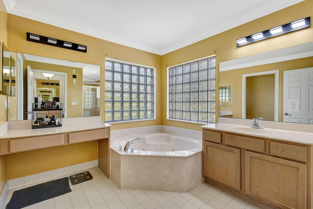 bathroom with crown molding, vanity, a tub with jets, and tile patterned floors