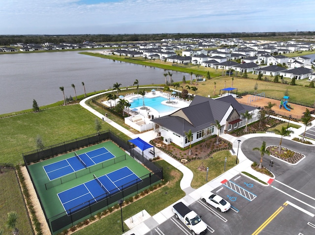 aerial view with a water view and a residential view