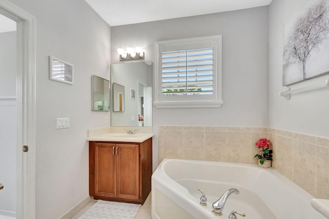 full bathroom with a garden tub and vanity