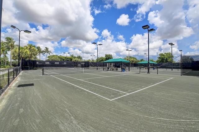 view of sport court with fence