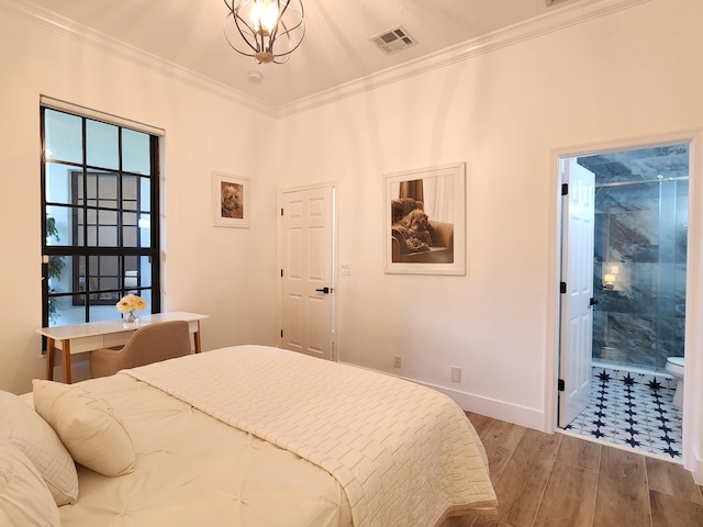 bedroom with visible vents, ornamental molding, wood finished floors, a chandelier, and baseboards