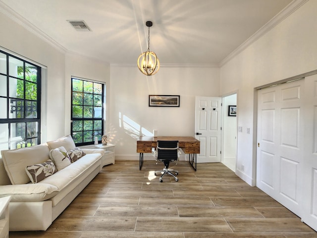 office area featuring baseboards, visible vents, ornamental molding, wood finish floors, and a chandelier