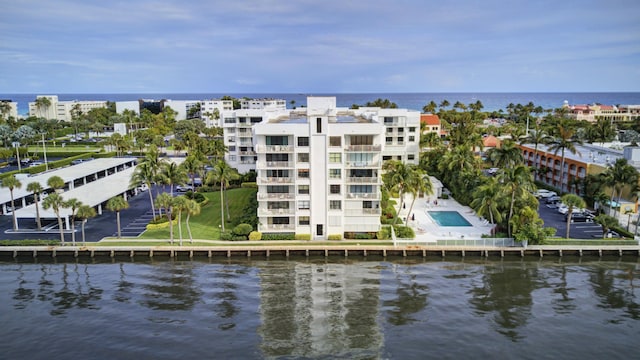 birds eye view of property featuring a water view