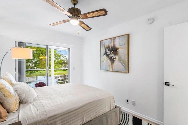 bedroom with access to exterior, baseboards, and a ceiling fan