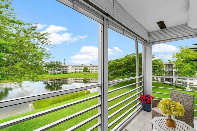 balcony featuring a water view