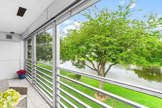 balcony featuring a water view