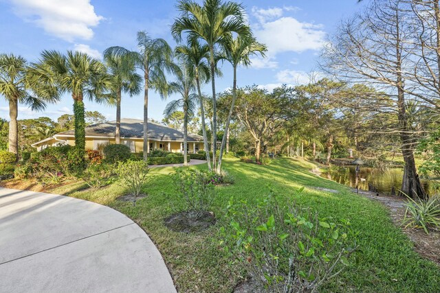 view of property's community with fence