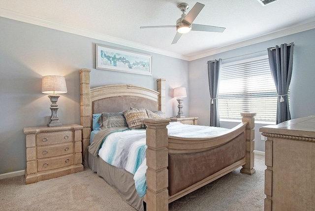 bedroom featuring light carpet, baseboards, ornamental molding, and a ceiling fan