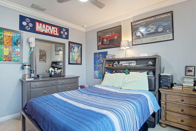 carpeted bedroom featuring crown molding, visible vents, a ceiling fan, a textured ceiling, and baseboards