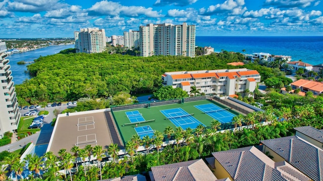 aerial view featuring a view of city and a water view