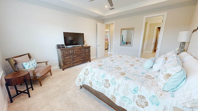 9592 SW Royal Poinciana Dr, Port Saint Lucie, FL 34987 - bedroom with visible vents, baseboards, light colored carpet, a tray ceiling, and recessed lighting