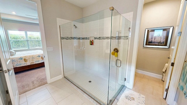 9592 SW Royal Poinciana Dr, Port Saint Lucie, FL 34987 - full bathroom featuring baseboards, a shower stall, ensuite bath, and tile patterned floors