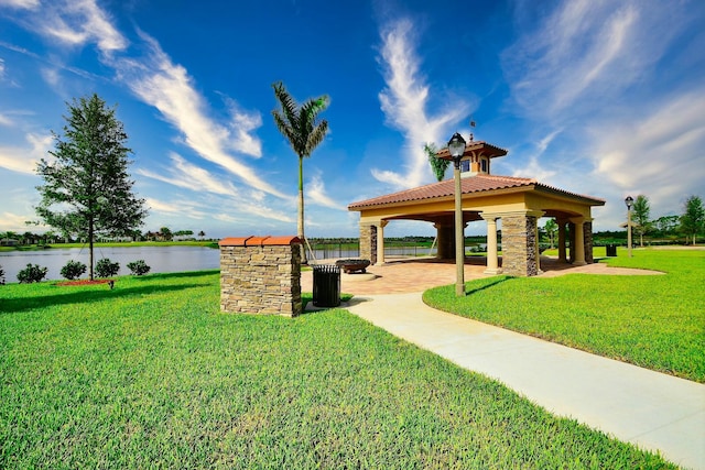 9592 SW Royal Poinciana Dr, Port Saint Lucie, FL 34987 - view of home's community featuring a water view, a lawn, and a gazebo