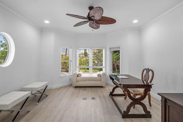 living area featuring baseboards, recessed lighting, light wood-style flooring, and crown molding