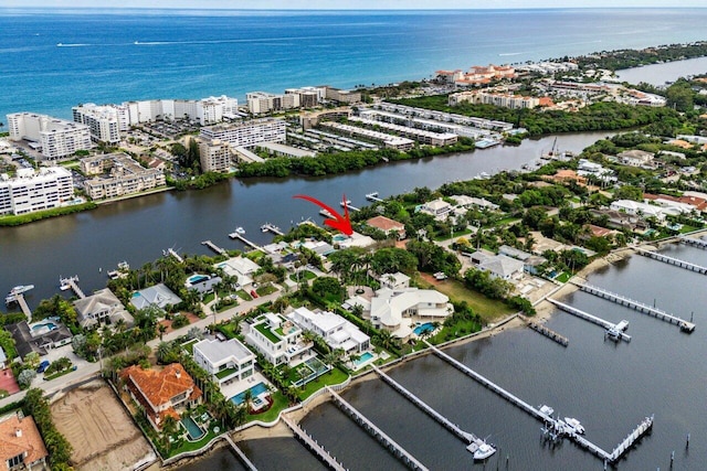 aerial view with a water view and a city view