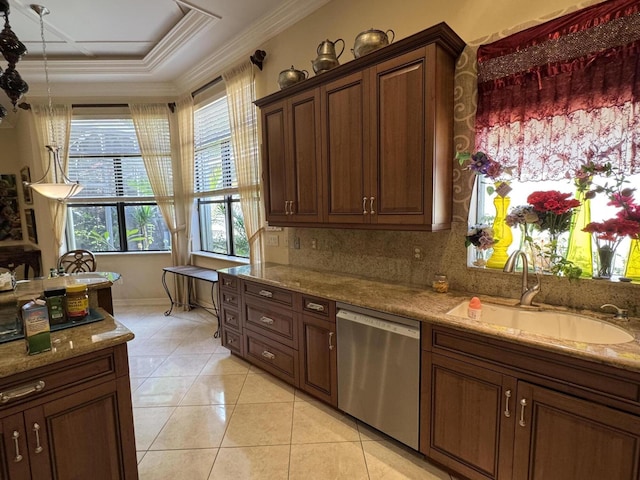 kitchen featuring light tile patterned floors, dishwasher, ornamental molding, light stone counters, and a sink