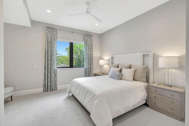 carpeted bedroom with a ceiling fan, recessed lighting, and baseboards