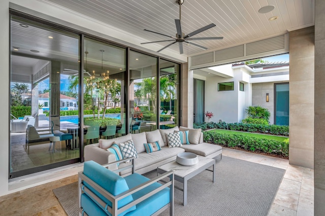 view of patio / terrace with a ceiling fan and outdoor lounge area