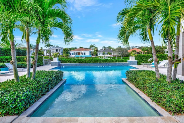 view of swimming pool featuring a patio