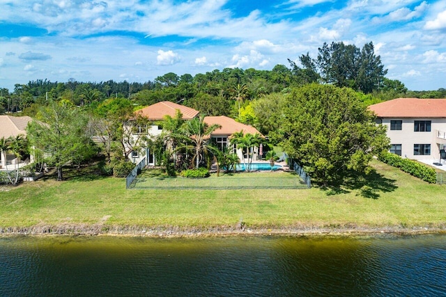 drone / aerial view with a water view