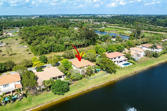 birds eye view of property featuring a water view