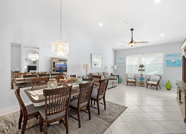 dining room with high vaulted ceiling, light tile patterned flooring, recessed lighting, ceiling fan with notable chandelier, and visible vents