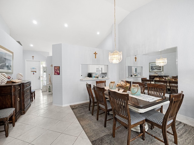 dining room with high vaulted ceiling, recessed lighting, light tile patterned flooring, a chandelier, and baseboards