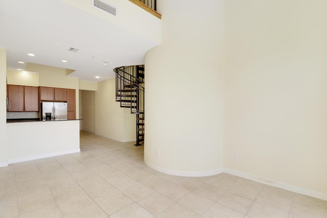 interior space with recessed lighting, visible vents, stairway, and baseboards