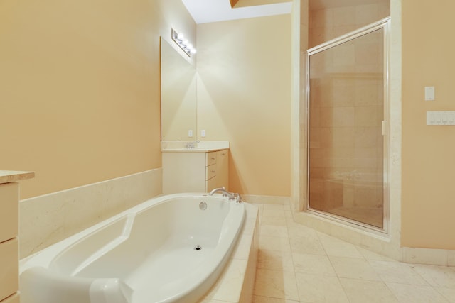 full bath featuring tile patterned flooring, a shower stall, a bath, and vanity