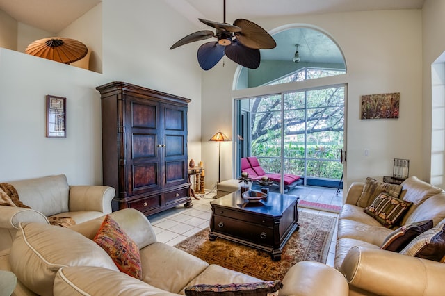 6861 Briarlake Cir, Palm Beach Gardens, FL 33418 - living room with high vaulted ceiling, a ceiling fan, and light tile patterned floors