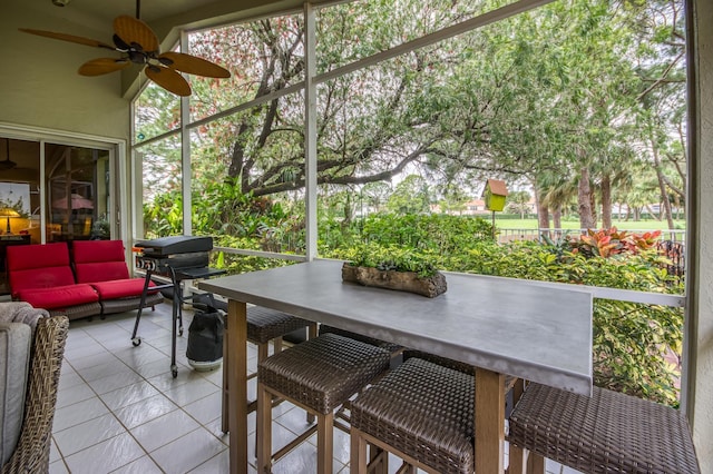 6861 Briarlake Cir, Palm Beach Gardens, FL 33418 - sunroom / solarium with a ceiling fan, outdoor dining space, and an outdoor living space