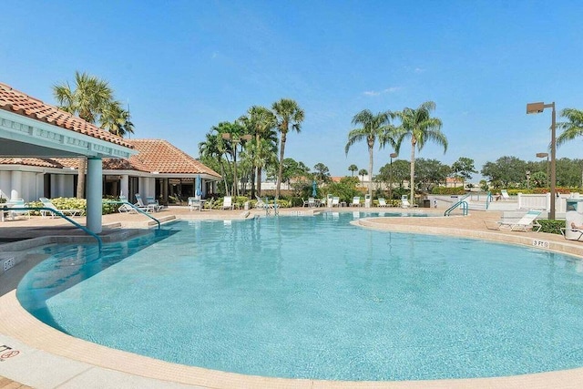 pool with a patio