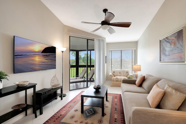 living room featuring ceiling fan and light tile patterned floors