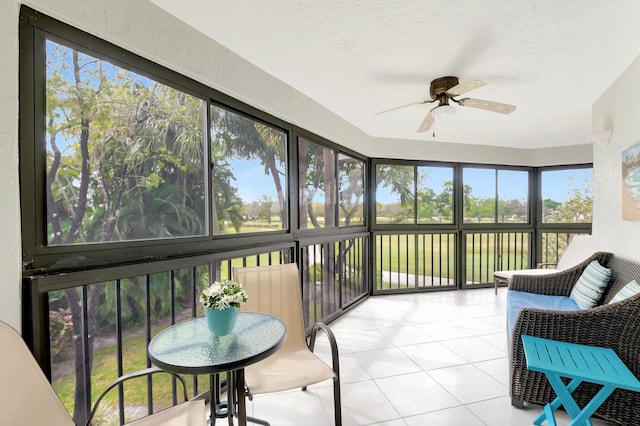 sunroom / solarium with ceiling fan