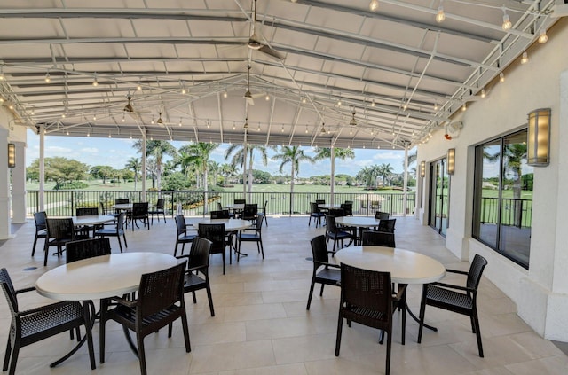 view of patio / terrace featuring outdoor dining area and fence