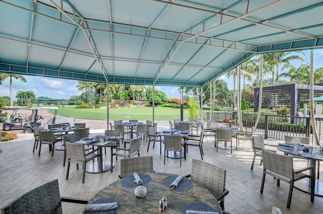 view of patio / terrace with outdoor dining area and fence