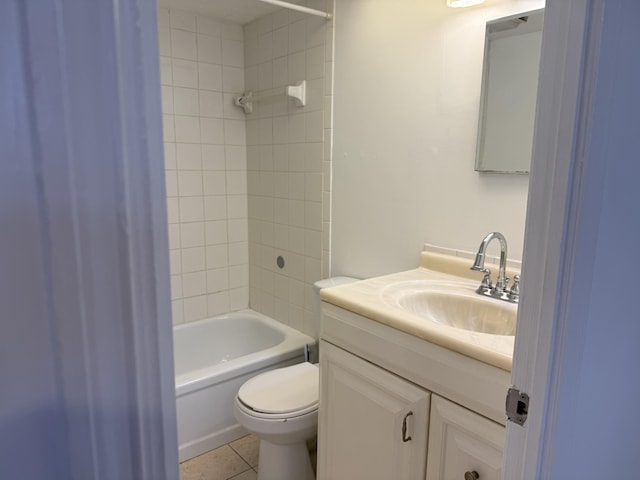 full bathroom featuring tile patterned floors, toilet, vanity, and bathing tub / shower combination