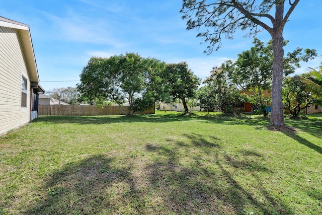 view of yard featuring fence