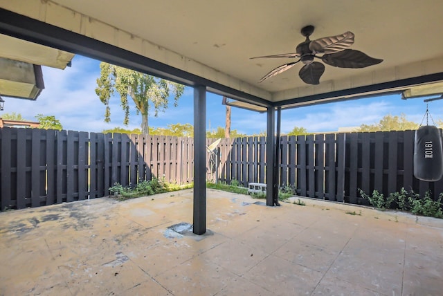 view of patio featuring ceiling fan and a fenced backyard