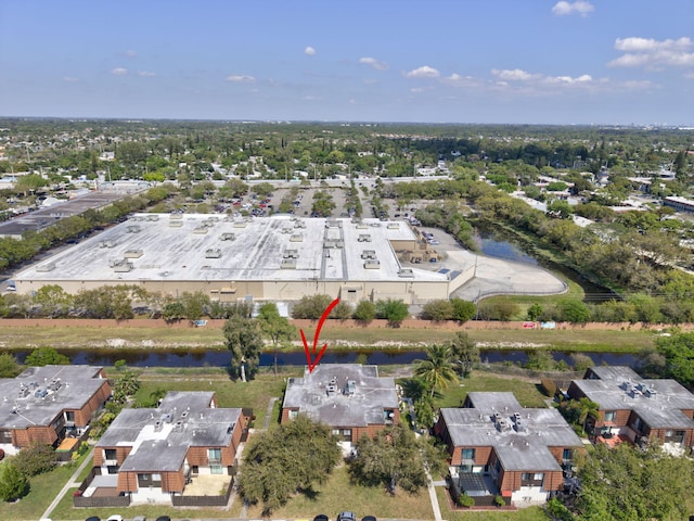 aerial view featuring a water view and a residential view