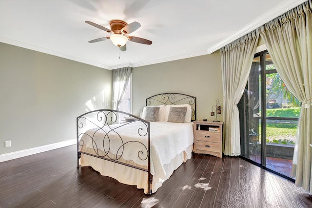 bedroom with crown molding, baseboards, ceiling fan, and wood finished floors