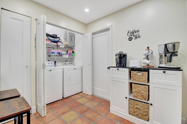 laundry room with recessed lighting, laundry area, independent washer and dryer, and light tile patterned floors