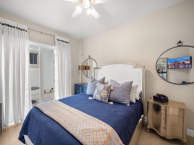 bedroom featuring ceiling fan and tile patterned floors