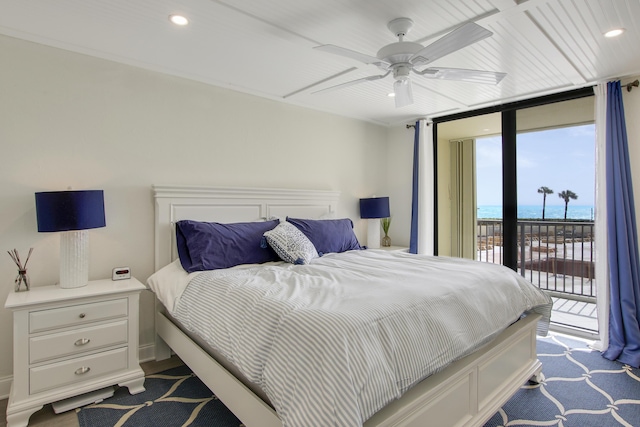 bedroom with access to outside, floor to ceiling windows, ceiling fan, and recessed lighting