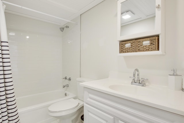 bathroom featuring shower / tub combo with curtain, vanity, and toilet