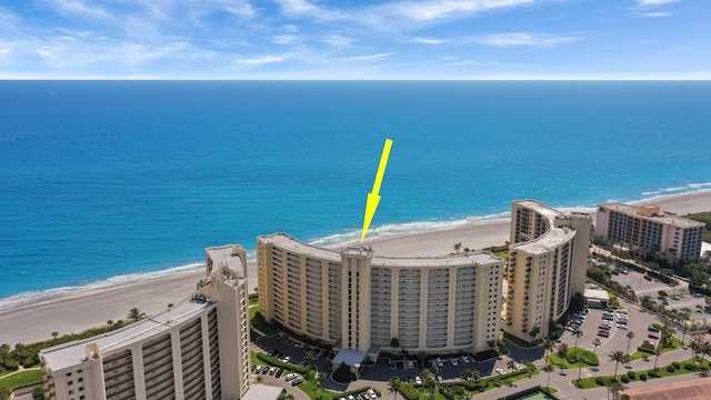 aerial view with a beach view and a water view